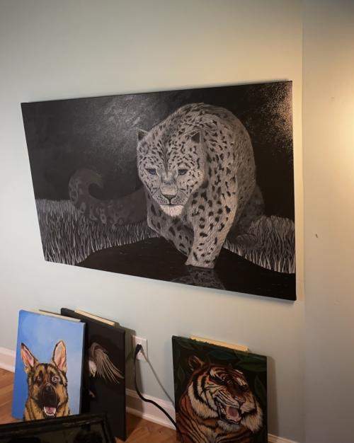 a black, white, and gray painting of a cheetah stalking through the grass