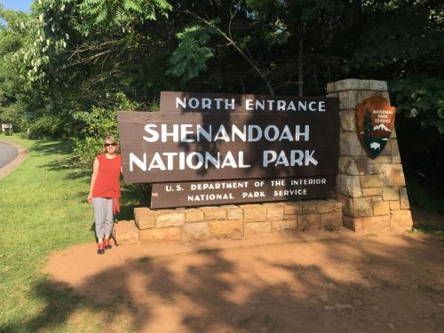 Bendte poses in front of the Shenandoah National Park sign.